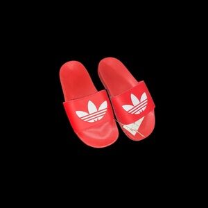 Red Adidas Adilette Lite slide sandals
